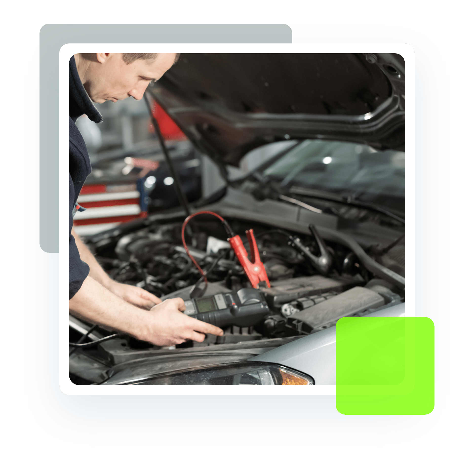 Image of an auto technician checking the battery of a car with hood up. Concept image of auto repair and maintenance at Quality Car Care in North Liberty, IA.