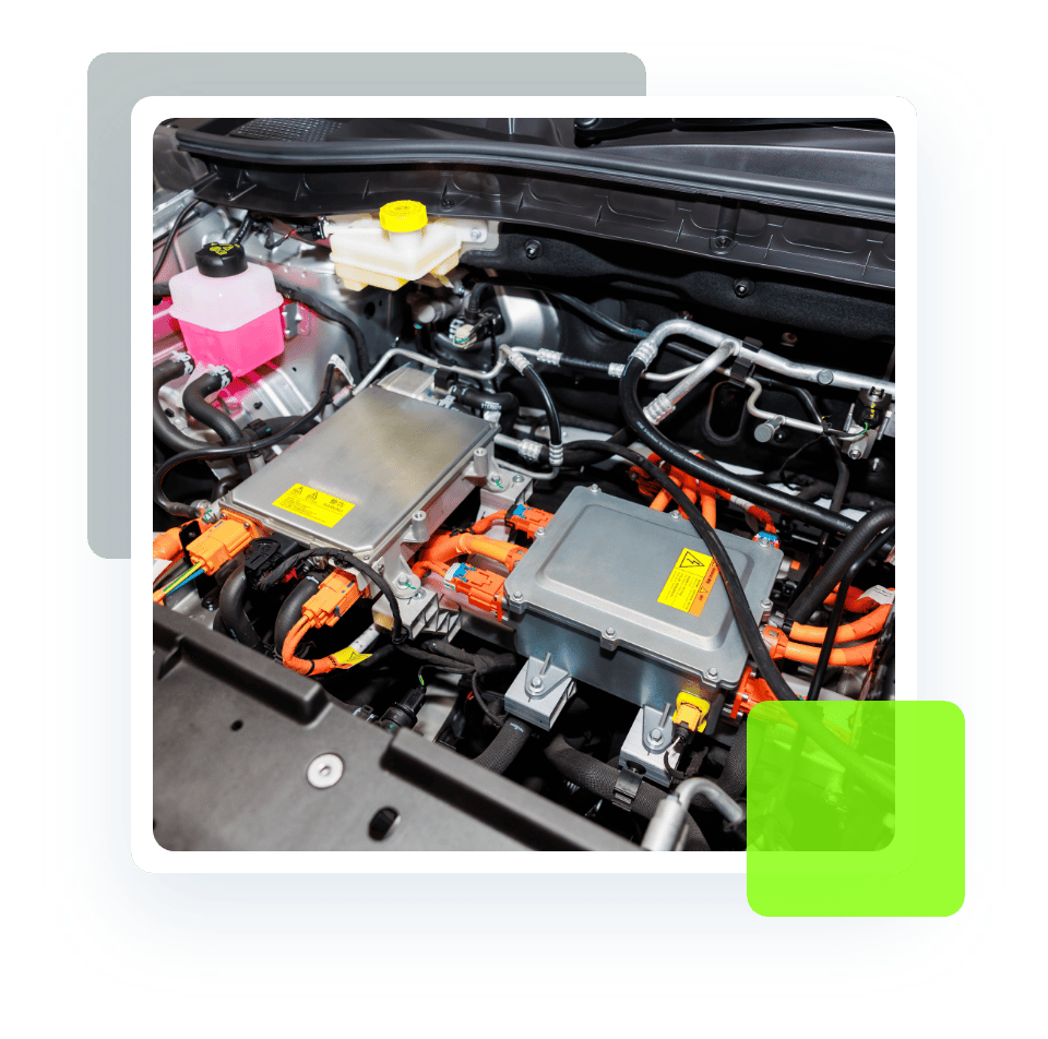 Image of an interior of a hybrid car showing engine and coolant reservoir. Concept image of hybrid services and repair at Quality Car Care in North Liberty, IA.