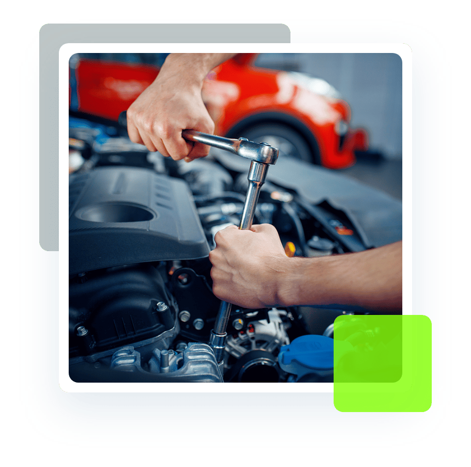 Image of an auto mechanic's hand fixing a car. Concept image of preventative maintenance at Quality Car Care in North Liberty, IA.