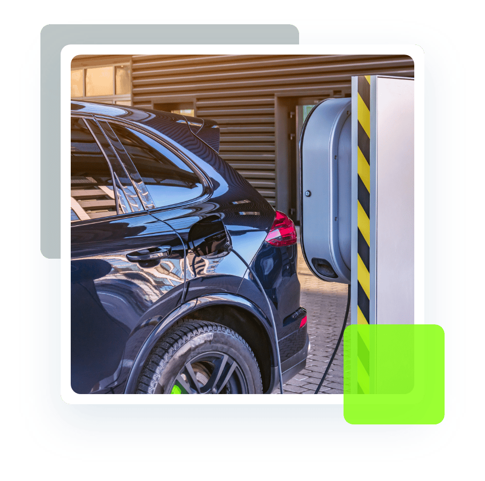 Image of an electric car being charged in a charging station. Concept image of hybrid services and repair at Quality Car Care in North Liberty, IA.