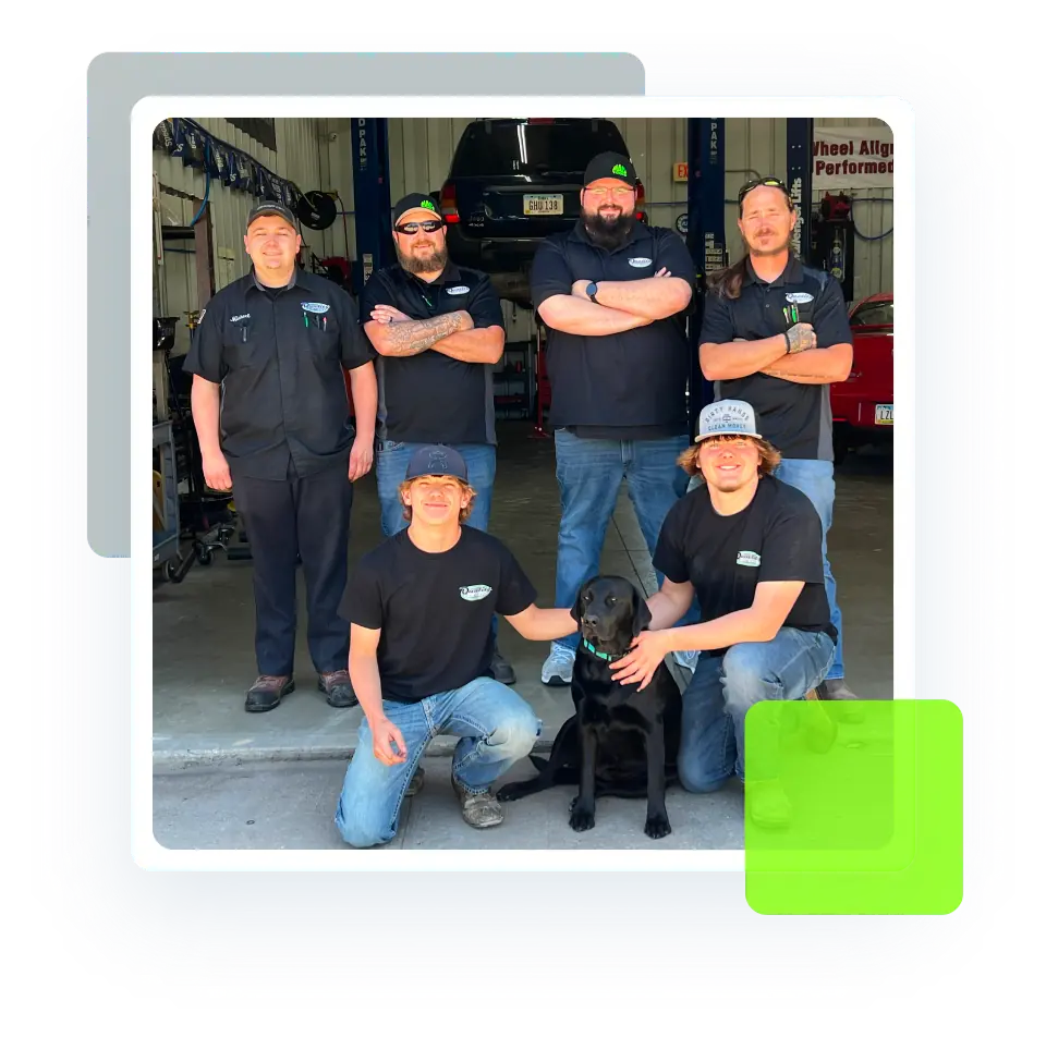 a group of men posing for a photo